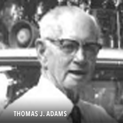 THOMAS J. ADAMS